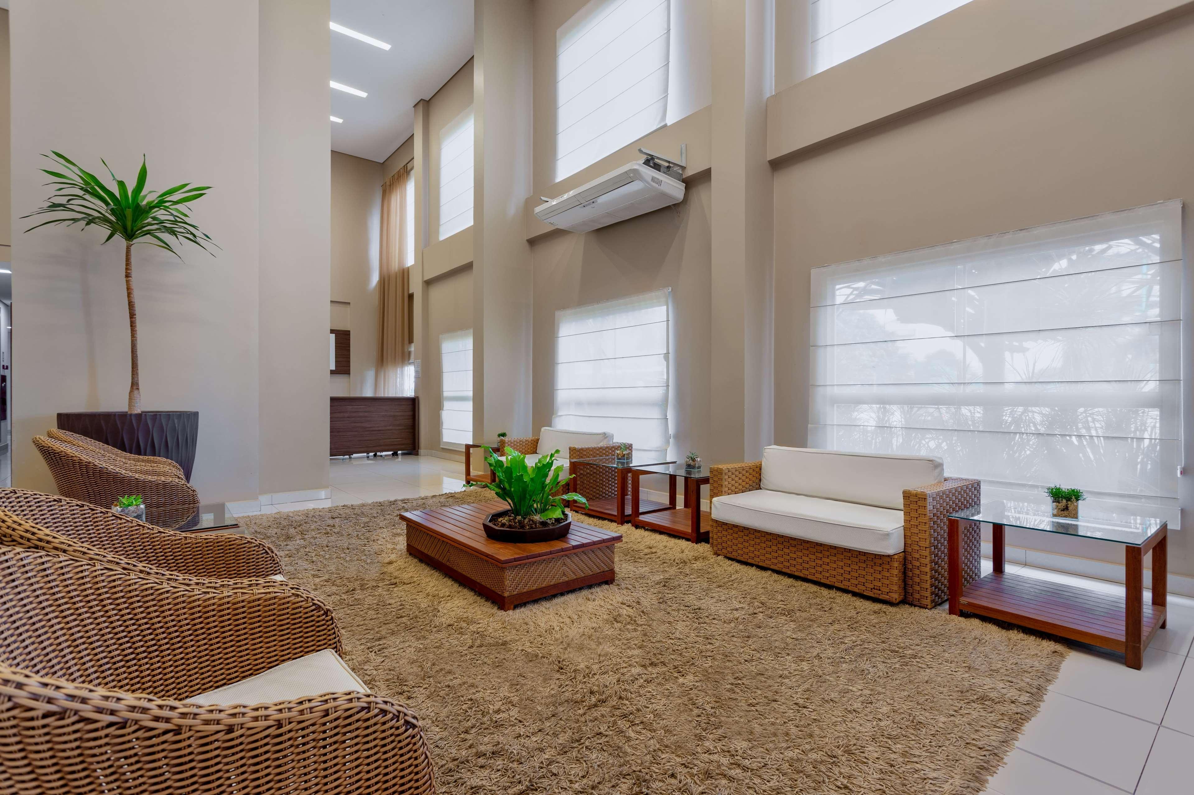 Wyndham Olimpia Royal Hotels Eksteriør billede A living room with a carpet